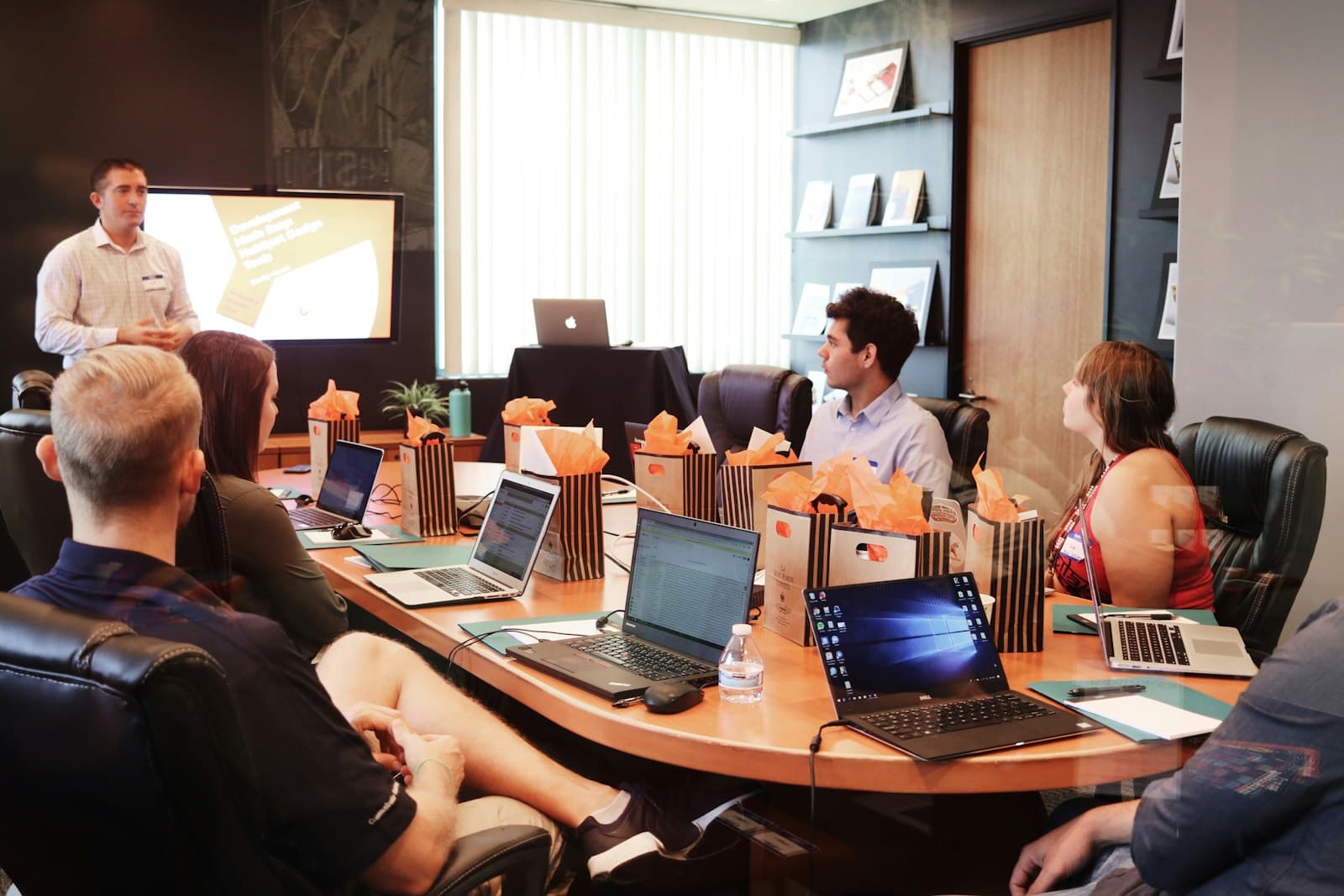 Modern corporate executive meeting and business advisory discussion at Anvard Global
